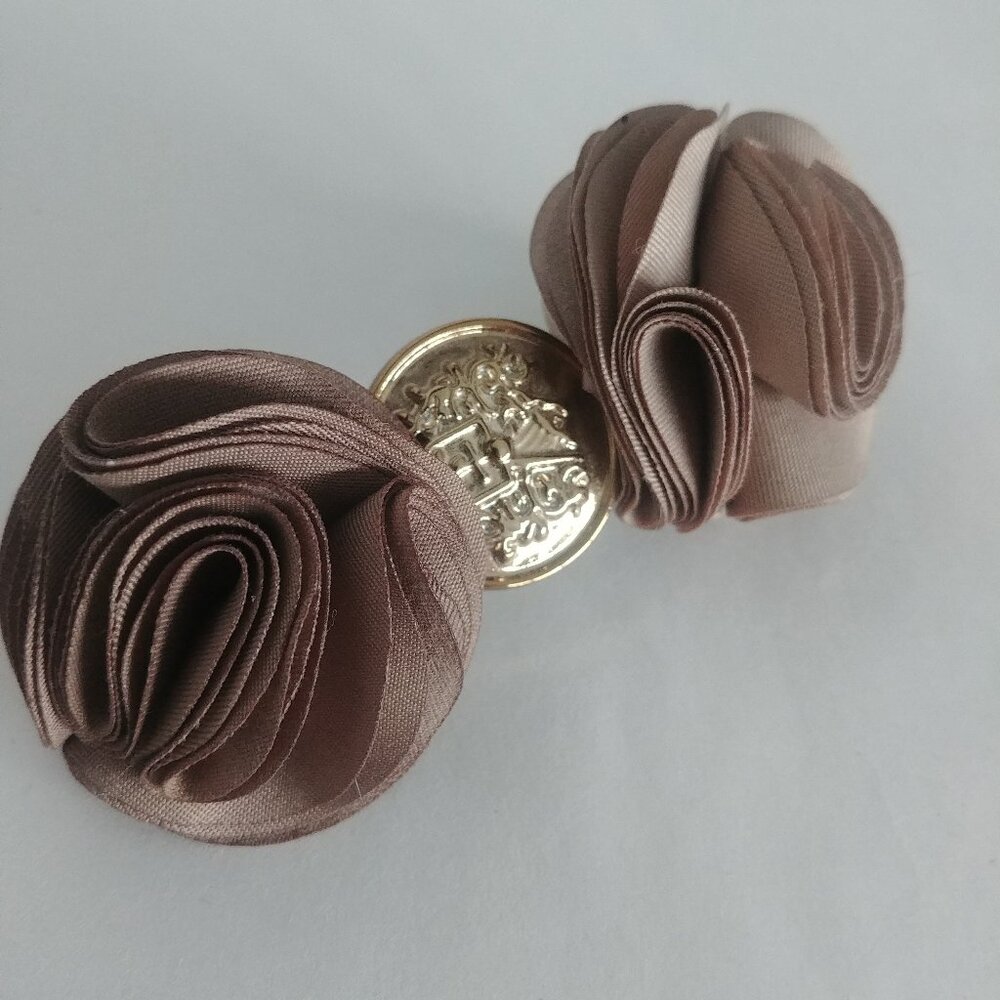 Taupe brown rosette hair clip with engraved gold tone detail